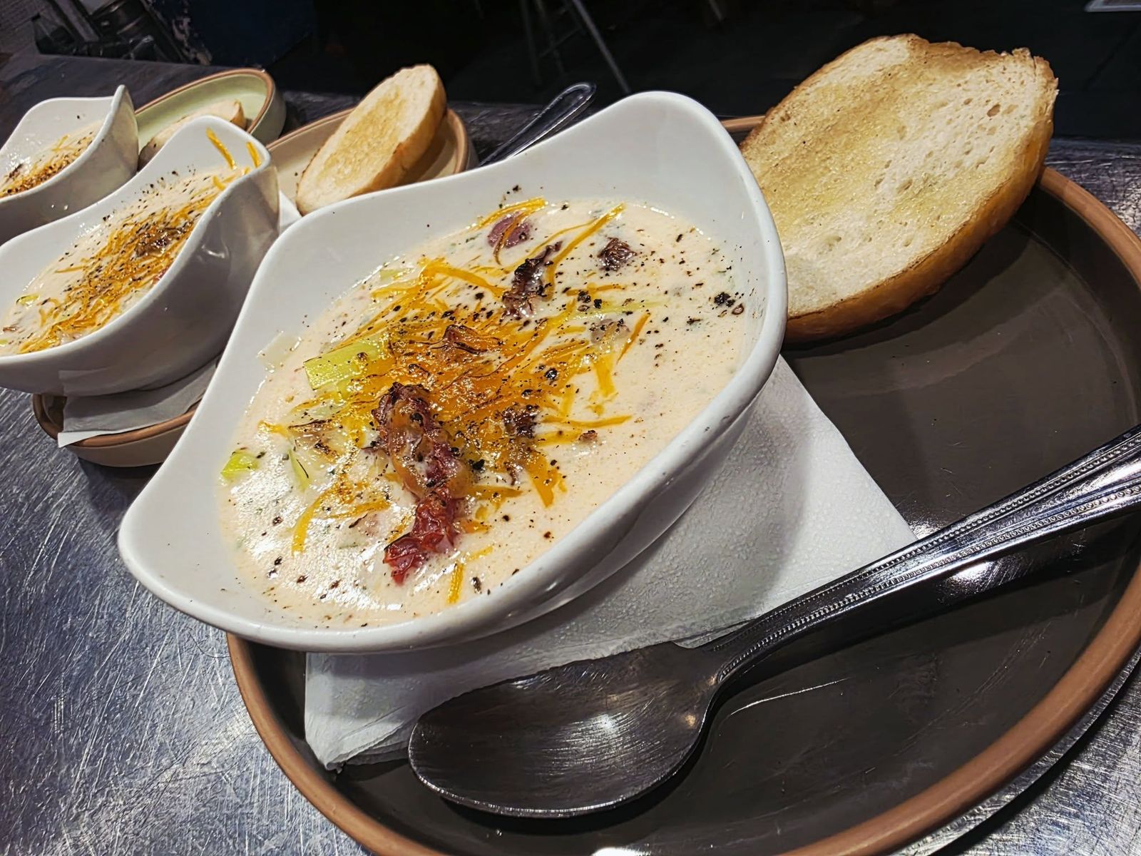 BLTP Chowder at Borracho's: bacon, leek, potato and tomato in a rich creamy chowder, topped with shredded cheddar and served with toasted bread. $6 cup, $12 bowl