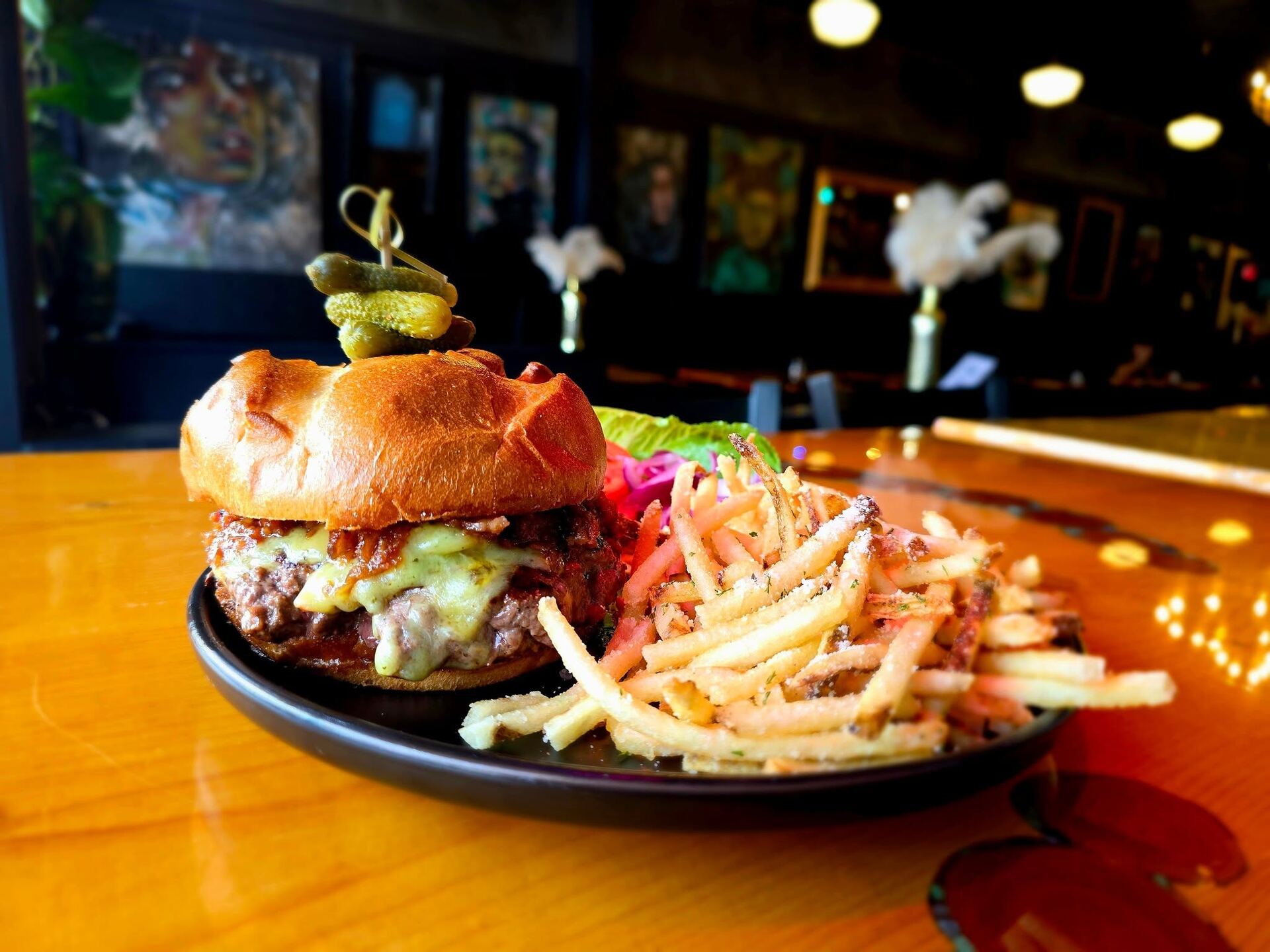 Green chile cheeseburger made from Borracho's family-ranch beef