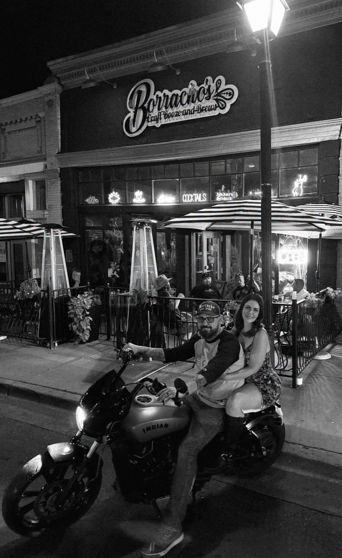 Ryan and Sara Jo celebrating one year of Borracho's, in front of the restaurant